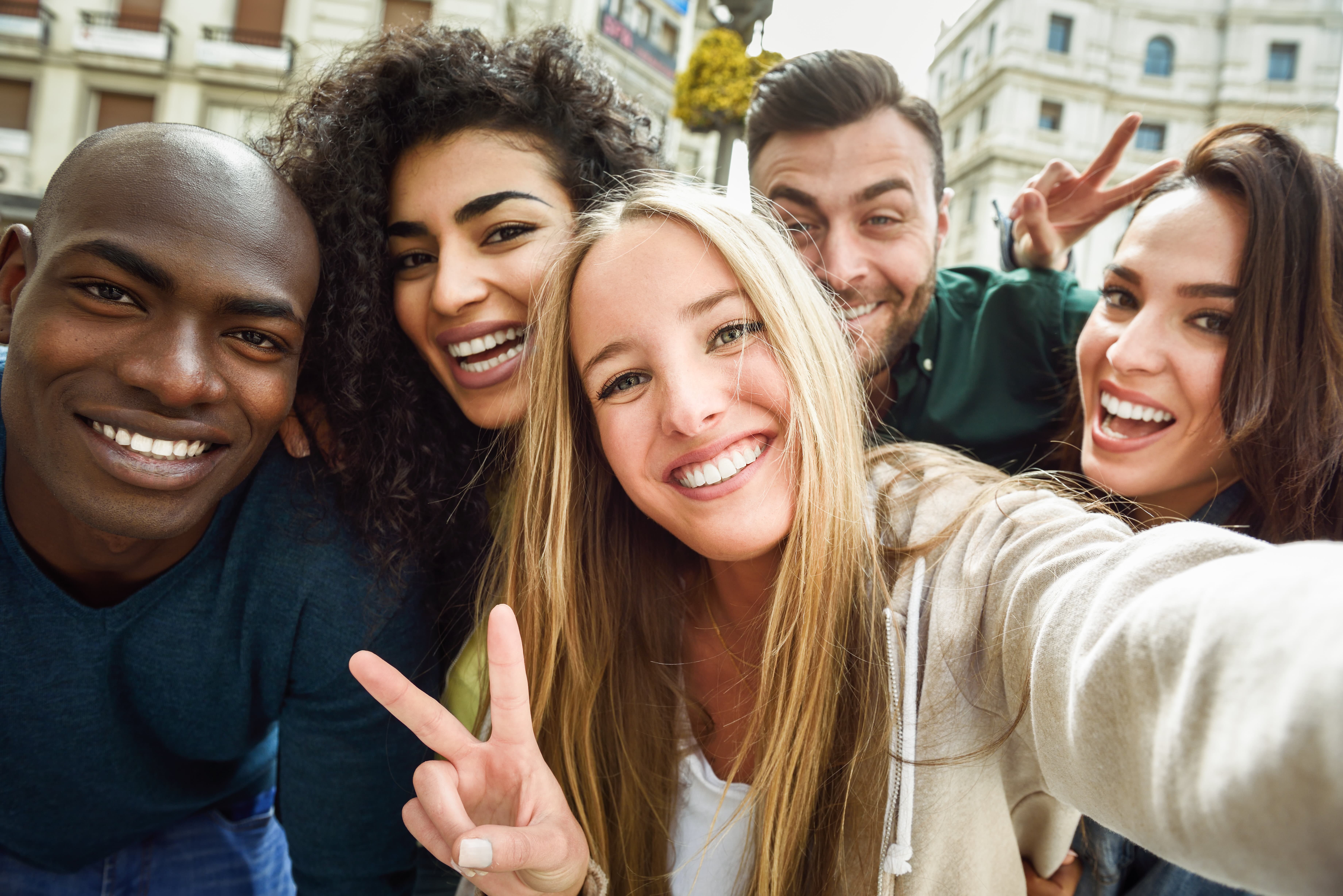 Happy diverse group of people celebrating
